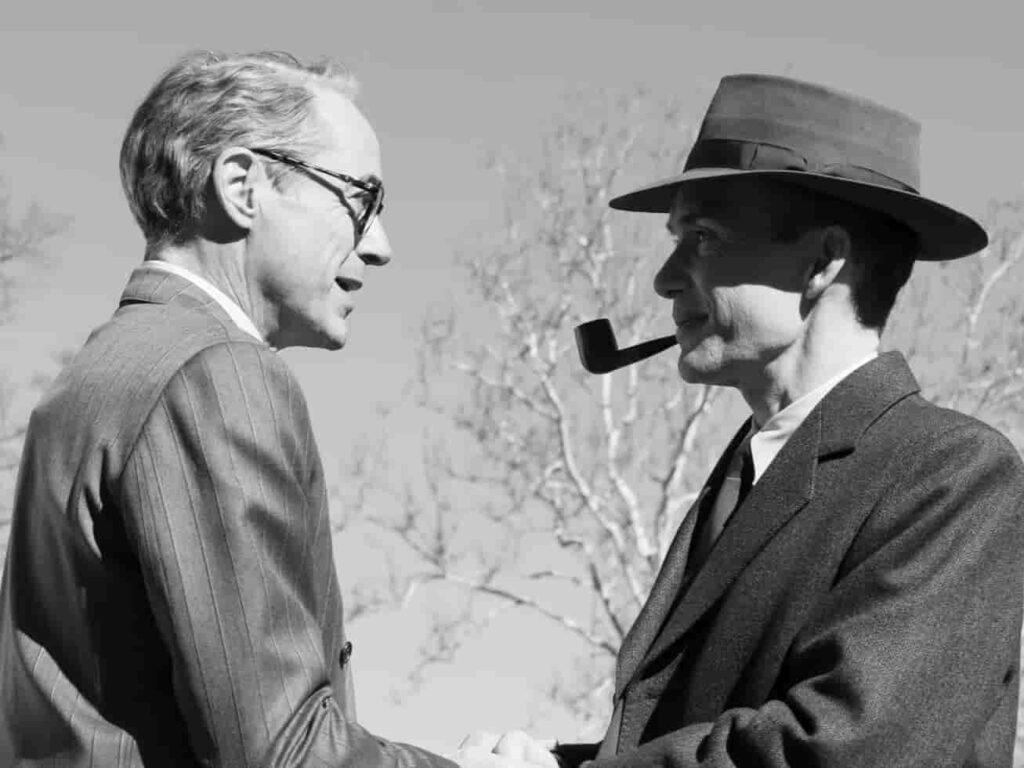 Einstein and Oppenheimer having a conversation.