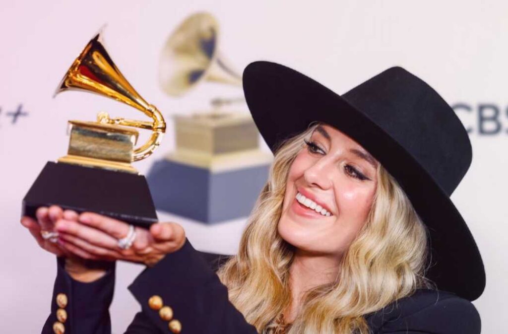 Lainey Wilson with Grammy award