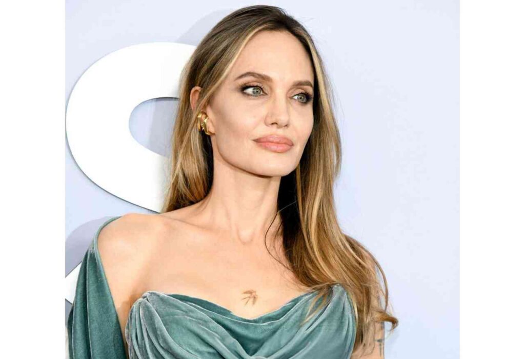 Angelina Jolie showcases a new bird tattoo on her chest