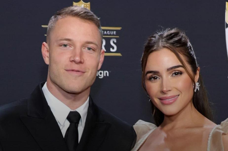 Christian McCaffrey and Olivia Culpo