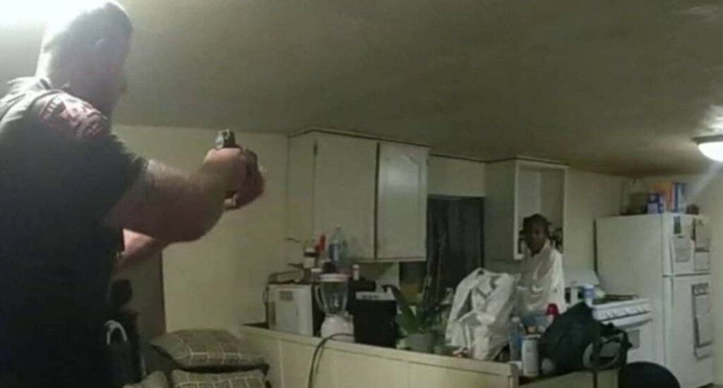 A screenshot from the body camera video showing Illinois deputy shooting Sonya Massey