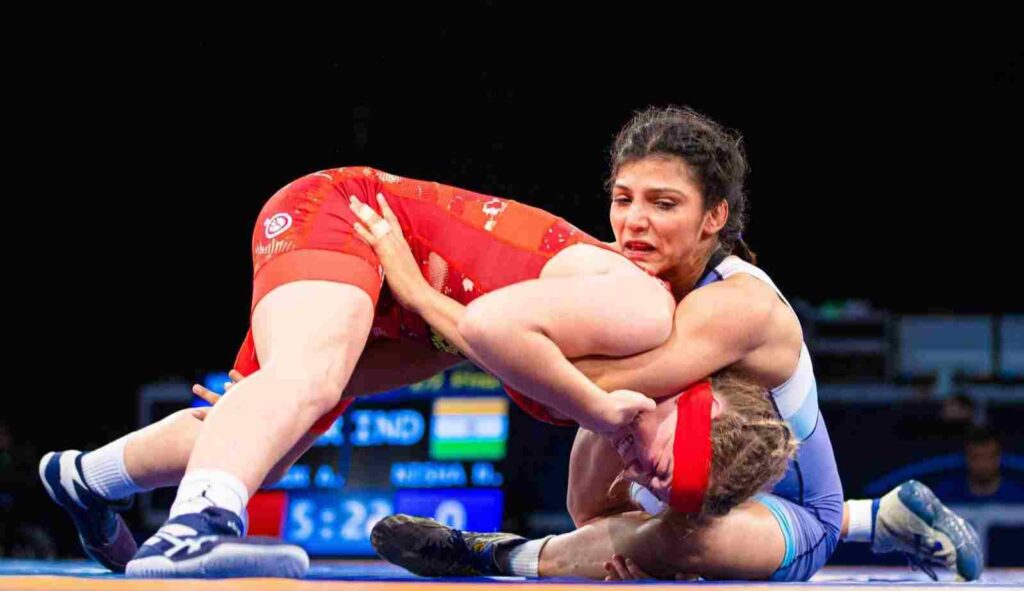 Nisha Dahiya wrestling another woman wrestling