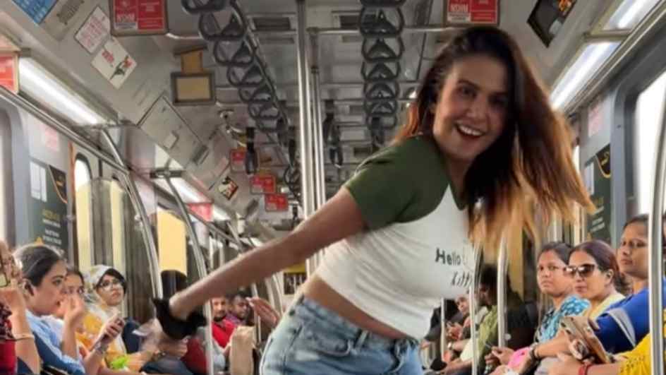 a woman dancing inside a metro